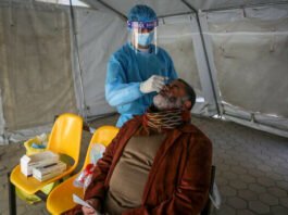 A nurse prepares a shot of the Pfizer coronavirus vaccine at a clinic in Gaza City, March 21, 2021. (Adel Hana/AP)