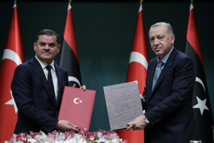 Screenshot 2021-04-13 at 12.22.44 PM Turkish President Recep Tayyip Erdogan, right, said the deal 'secured the national interests and future of the two countries' after meeting with Libyan Prime Minister Abdul Hamid Dbeibah in Ankara