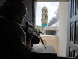 Troops from the 551st Brigade cleared a school in Gaza City's Jabaliya, previously used as a civilian shelter, revealing a cache of weapons belonging to Hamas operatives