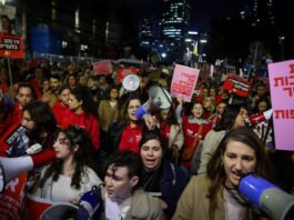 The scenes echoed the fervor of last year's nationwide protests over the government's judicial overhaul, as protesters briefly blocked Tel Aviv's main Ayalon Highway