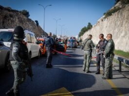 Police at the scene of a terror shooting attack outside of Ma'aleh Adumim in the West Bank