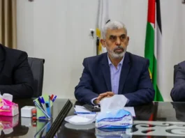 Yahya Sinwar, leader of the Hamas terror group, hosts a meeting with members of Palestinian factions, at the Hamas president's office in Gaza City, on April 13, 2022. (Attia Muhammed/Flash90)