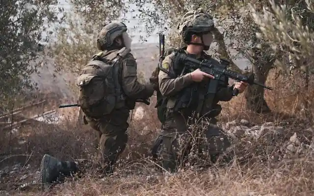 Troops of the 36th Division are seen operating in southern Lebanon, in handout image published October 2, 2024. (Israel Defense Forces) Troops of the 36th Division are seen operating in southern Lebanon, in handout image published October 2, 2024. (Israel Defense Forces)