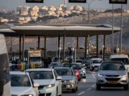 Israeli police inspectors and bomb squad unit are seen at the scene where Israeli Border Police forces shot at a driver who allegedly attempted to ram his vehicle into security personnel in az-Za'ayyem checkpoint near Ma’ale Adumim, November 25, 2020. (photo credit: YONATAN SINDEL/FLASH90)