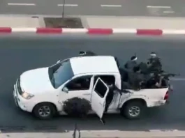 Armed terrorists in Sderot, southern Israel, having infiltrated from Gaza, on the morning of October 7, 2023 (X screenshot; used in accordance with Clause 27a of the Copyright Law)