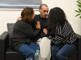 Released hostage Eli Sharabi reunited with his family following his release from Gaza, February 8, 2025 (credit: IDF SPOKESPERSON'S UNIT)