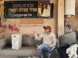 Emily Damari at the ruined home from where she was abducted by terrorists on October 7, 2023, seen during a visit to the site, February 2, 2025. (Emily Damari/Instagram)