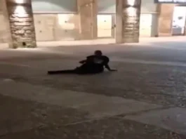 Ahmad Nijam lies on the ground after being shot in downtown Jerusalem on March 12, 2025. (Screen capture/X)