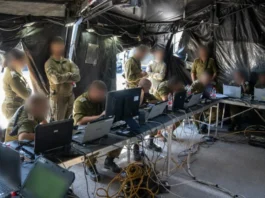 Caskets of Mar Elias Church bombing victims are carried during funerals in Damascus, Syria, on June 24, 2025. (REUTERS/KHALIL ASHAWI)