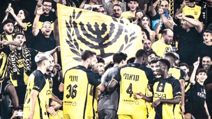 Beitar Jerusalem players celebrate after dismantling Hapoel Haifa 5-0 to secure their place in the Toto Cup final