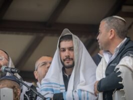 Eliya Cohen and Ziv Abud celebrate the elimination of his abductor in Re’im attack by Israeli forces