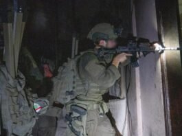Visitors gather at Hostage Square in Tel Aviv ahead of the ceasefire announcement between Israel and Hamas