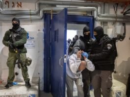 Israeli soldiers patrol near the Gaza border after foiling Hamas militants’ attempt to reach a weapons cache hidden in a mosque