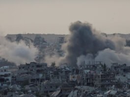 Smoke rises over Gaza following Israeli strikes as tensions escalate after renewed ceasefire violations and targeted operations against Hamas commanders