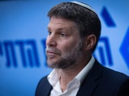 Finance Committee chair Hanoch Milwidsky speaks during a tense Knesset session debating expanded financial benefits for IDF reservists