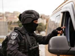 Palestinian laborers return to Gaza via the Rafah crossing after Israel revoked work permits following heightened security concerns