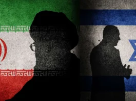 Iran Arrests Swedish Citizen on Alleged Israeli Espionage Charges An Israeli man walks past graffiti of Iran’s Supreme Leader in Tel Aviv following the recent Iran-Israel conflict