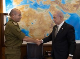 Roman Gofman walks through the Knesset in Jerusalem during his duties as Netanyahu’s military secretary in November 2024
