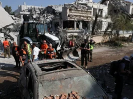 Israeli citizens wave flags during rally as emergency commanders stress readiness against Iranian missile and infrastructure threats nationwide